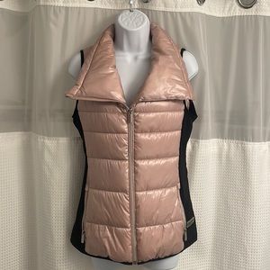 Women’s Calvin Klein puffer vest.  Blush with black sides. Size XS. Like New!